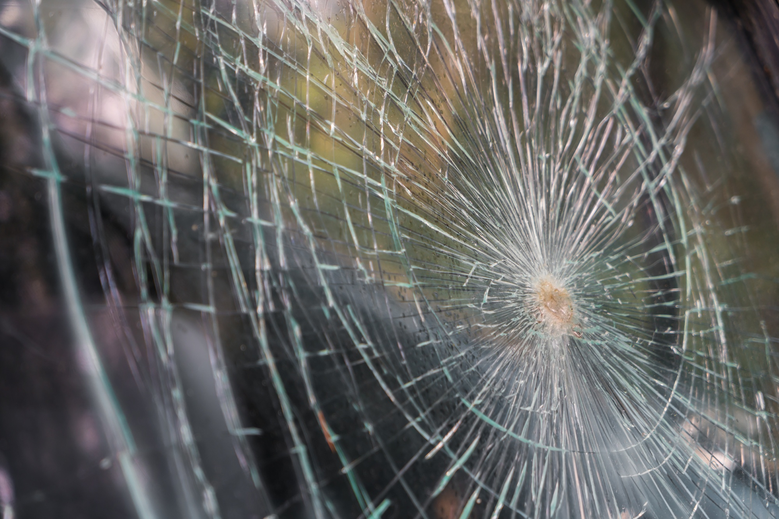 A cracked windshield that will need windshield repair.