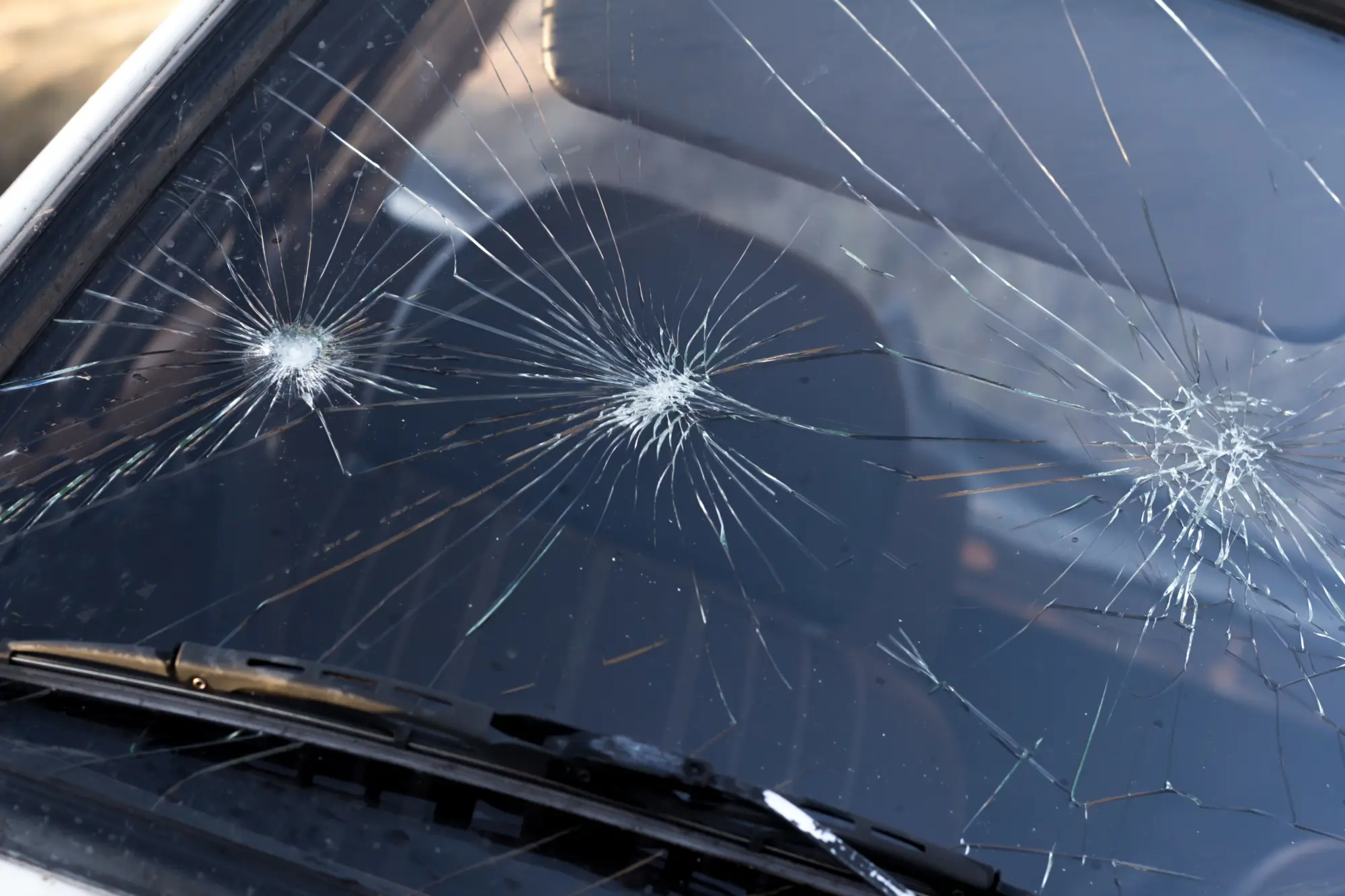 A broken windshield in need of windshield repair.